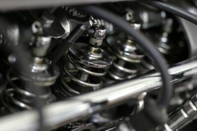 Close-up of engine components where carbon buildup forms